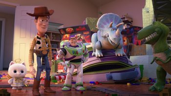 Movie still from “Toy Story That Time Forgot” (2014), directed by Steve Purcell – Toy story characters standing next to each other in a living room; Wide shot, Over the shoulder angle