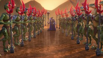 Movie still from “Toy Story That Time Forgot” (2014), directed by Steve Purcell – A group of people that are standing in the dirt; Extreme Wide shot, High angle