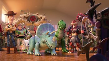 Movie still from “Toy Story That Time Forgot” (2014), directed by Steve Purcell – A group of toy dinosaurs standing on a wooden floor; Wide shot, Low angle