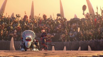 Movie still from “Toy Story That Time Forgot” (2014), directed by Steve Purcell – A group of people standing in front of a wall; Wide shot, High angle