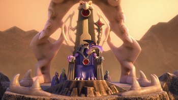 Movie still from “Toy Story That Time Forgot” (2014), directed by Steve Purcell – A statue of a purple creature sitting on top of a throne; Wide shot, Low angle