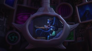 Movie still from “Toy Story That Time Forgot” (2014), directed by Steve Purcell – A reflection of two people sitting in a chair; Wide shot, High angle