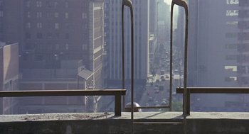 Movie still from “Truck Turner” (1974), directed by Jonathan Kaplan – A view of a city from a window ledge; Extreme Wide shot, Overhead angle