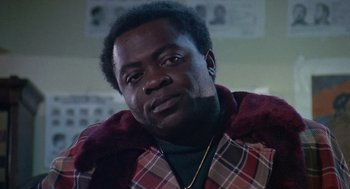 Movie still from “Truck Turner” (1974), directed by Jonathan Kaplan – A person wearing a jacket; Close Up shot, Low angle