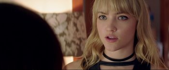 Movie still from “Truth or Dare” (2018), directed by Jeff Wadlow – A person wearing a necklace; Close Up shot, Over the shoulder angle