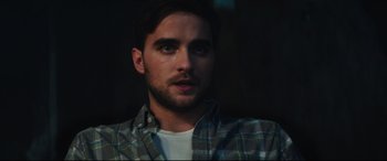 Movie still from “Truth or Dare” (2018), directed by Jeff Wadlow – A person wearing a plaid shirt; Close Up shot, Low angle