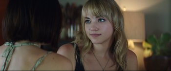 Movie still from “Truth or Dare” (2018), directed by Jeff Wadlow – A person with long blonde hair; Close Up shot, Over the shoulder angle