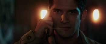 Movie still from “Truth or Dare” (2018), directed by Jeff Wadlow – A person talking on a cell phone; Close Up shot, Low angle