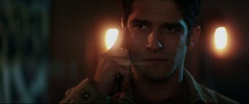 Movie still from “Truth or Dare” (2018), directed by Jeff Wadlow – A person holding a cell phone; Close Up shot, Low angle