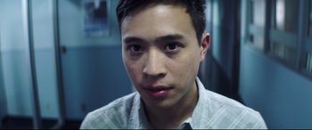 Movie still from “Truth or Dare” (2018), directed by Jeff Wadlow – A young man's face; Close Up shot, Low angle