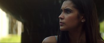 Movie still from “Truth or Dare” (2018), directed by Jeff Wadlow – A person with long black hair; Close Up shot, Low angle
