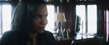 Movie still from “Truth or Dare” (2018), directed by Jeff Wadlow – A person sitting in a room; Close Up shot, Low angle