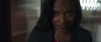 Movie still from “Truth or Dare” (2018), directed by Jeff Wadlow – A person with long black hair; Close Up shot, Low angle