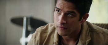 Movie still from “Truth or Dare” (2018), directed by Jeff Wadlow – A person wearing a jacket; Close Up shot, Over the shoulder angle