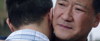 Movie still from “Truth or Dare” (2018), directed by Jeff Wadlow – A man's face with a man's ear; Close Up shot, Over the shoulder angle