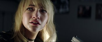 Movie still from “Truth or Dare” (2018), directed by Jeff Wadlow – A person holding a cell phone; Close Up shot, Over the shoulder angle