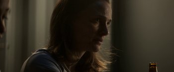 Movie still from “Annihilation” (2018), directed by Alex Garland – A person with long brown hair; Close Up shot, Low angle