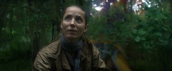 Movie still from “Annihilation” (2018), directed by Alex Garland – A person wearing a jacket and a scarf; Close Up shot, Low angle