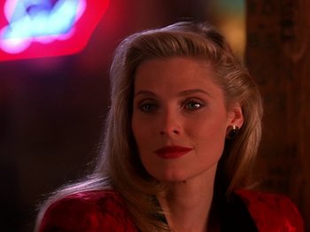 Movie still from “Twin Peaks” (1990), created by David Lynch – A person wearing a red jacket; Close Up shot, Over the shoulder angle