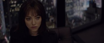 Movie still from “Anon” (2018), directed by Andrew Niccol – A person sitting in a chair; Close Up shot, Over the shoulder angle