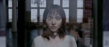 Movie still from “Anon” (2018), directed by Andrew Niccol – Close Up shot, Over the shoulder angle