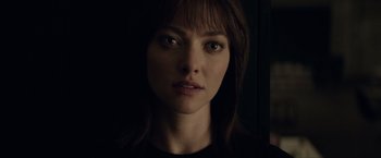 Movie still from “Anon” (2018), directed by Andrew Niccol – A woman's face in the dark; Close Up shot, Low angle