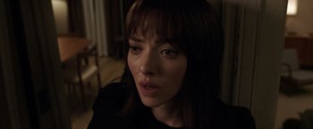 Movie still from “Anon” (2018), directed by Andrew Niccol – A person with long brown hair; Close Up shot, High angle