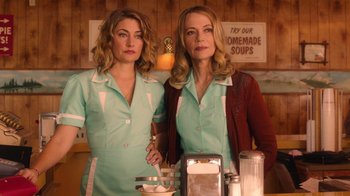 Movie still from “Twin Peaks” (2017), directed by David Lynch – A couple of women standing next to each other in a kitchen; Medium shot, Low angle