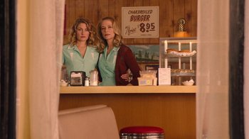 Movie still from “Twin Peaks” (2017), directed by David Lynch – A couple of women standing at a counter in a diner; Medium shot, Low angle