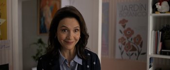 Movie still from “Anonymously Yours” (2021), directed by Maria Torres – A person wearing a jacket; Close Up shot, Over the shoulder angle