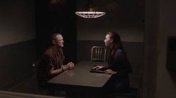 Movie still from “Twin Peaks” (2017), directed by David Lynch – A man and a woman are sitting at a table; Medium shot, Over the shoulder angle