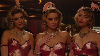 Movie still from “Twin Peaks” (2017), directed by David Lynch – A group of three women in pink dresses; Close Up shot, Over the shoulder angle