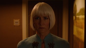 Movie still from “Twin Peaks” (2017), directed by David Lynch – A person wearing a jacket; Close Up shot, Over the shoulder angle