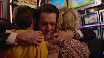 Movie still from “Twin Peaks” (2017), directed by David Lynch – A group of people hugging each other in a room; Close Up shot, Over the shoulder angle
