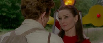 Movie still from “Two for the Road” (1967), directed by Stanley Donen – A man and a woman looking at one another; Close Up shot, Over the shoulder angle