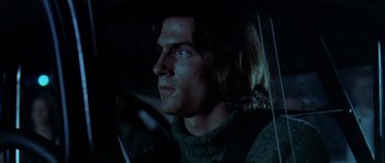 Movie still from “Two-Lane Blacktop” (1971), directed by Monte Hellman – A person sitting in a car; Close Up shot, Low angle