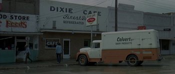 Movie still from “Two-Lane Blacktop” (1971), directed by Monte Hellman – An old truck parked in front of a diner; Wide shot, Low angle