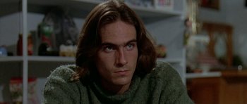 Movie still from “Two-Lane Blacktop” (1971), directed by Monte Hellman – A person with long hair; Close Up shot, Low angle