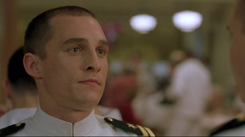 Movie still from “U-571” (2000), directed by Jonathan Mostow – A person wearing a uniform; Close Up shot, Low angle