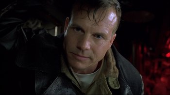 Movie still from “U-571” (2000), directed by Jonathan Mostow – A person wearing a leather jacket; Close Up shot, Low angle