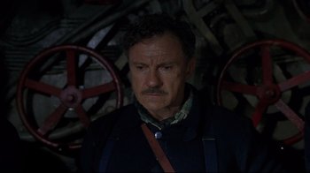 Movie still from “U-571” (2000), directed by Jonathan Mostow – A person wearing a jacket; Close Up shot, High angle