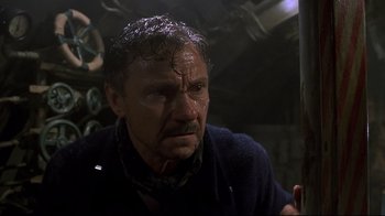 Movie still from “U-571” (2000), directed by Jonathan Mostow – A person wearing a sweater; Close Up shot, Low angle