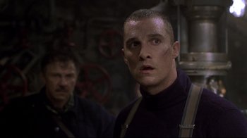 Movie still from “U-571” (2000), directed by Jonathan Mostow – A person wearing a jacket; Close Up shot, Low angle