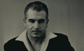 Movie still from “Ulysse” (1983), directed by Agnès Varda – An older man is wearing a black jacket; Close Up shot, Low angle