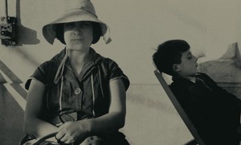 Movie still from “Ulysse” (1983), directed by Agnès Varda – An old photo of a woman and a boy; Medium shot, High angle