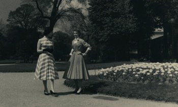 Movie still from “Ulysse” (1983), directed by Agnès Varda – Two young women standing next to each other in a park; Wide shot, Low angle