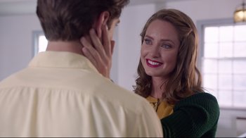 Movie still from “Unbroken: Path to Redemption” (2018), directed by Harold Cronk – A man and a woman are looking at one another; Close Up shot, Over the shoulder angle