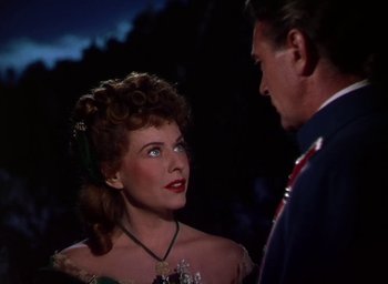 Movie still from “Unconquered” (1947), directed by Cecil B. DeMille – A man and a woman are talking to each other; Close Up shot, Over the shoulder angle
