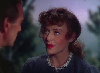 Movie still from “Unconquered” (1947), directed by Cecil B. DeMille – A person wearing a necklace; Close Up shot, Over the shoulder angle