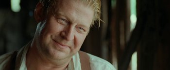 Movie still from “Under the Sun” (1998), directed by Colin Nutley – A person with blonde hair; Close Up shot, Low angle